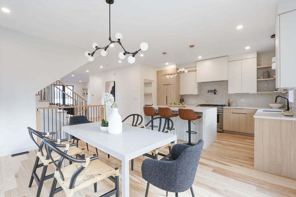 41 Nathan Road, Unit 1 Waltham, MA 02453 - Photo 8 of 25 a view of a dining room with furniture and a table