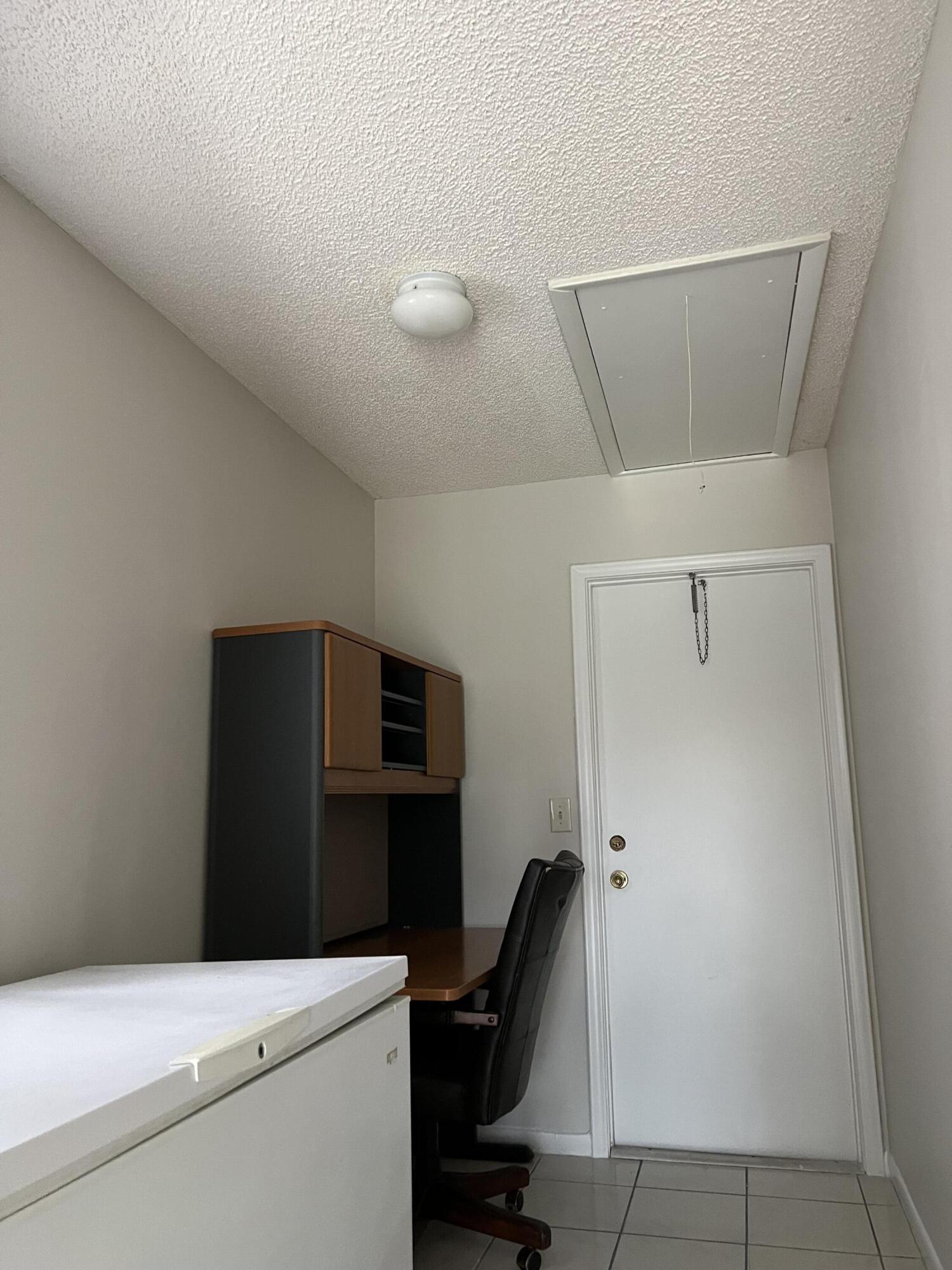 9775 Sun Pointe Drive Boynton Beach, FL 33437 - Photo 23 of 30 a view of workspace