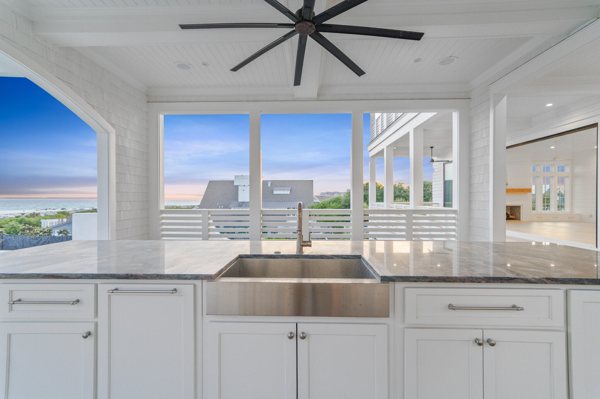 264 Grace Pt Way Watersound, FL 32461 - Photo 15 of 69 a kitchen with granite countertop a sink and cabinets