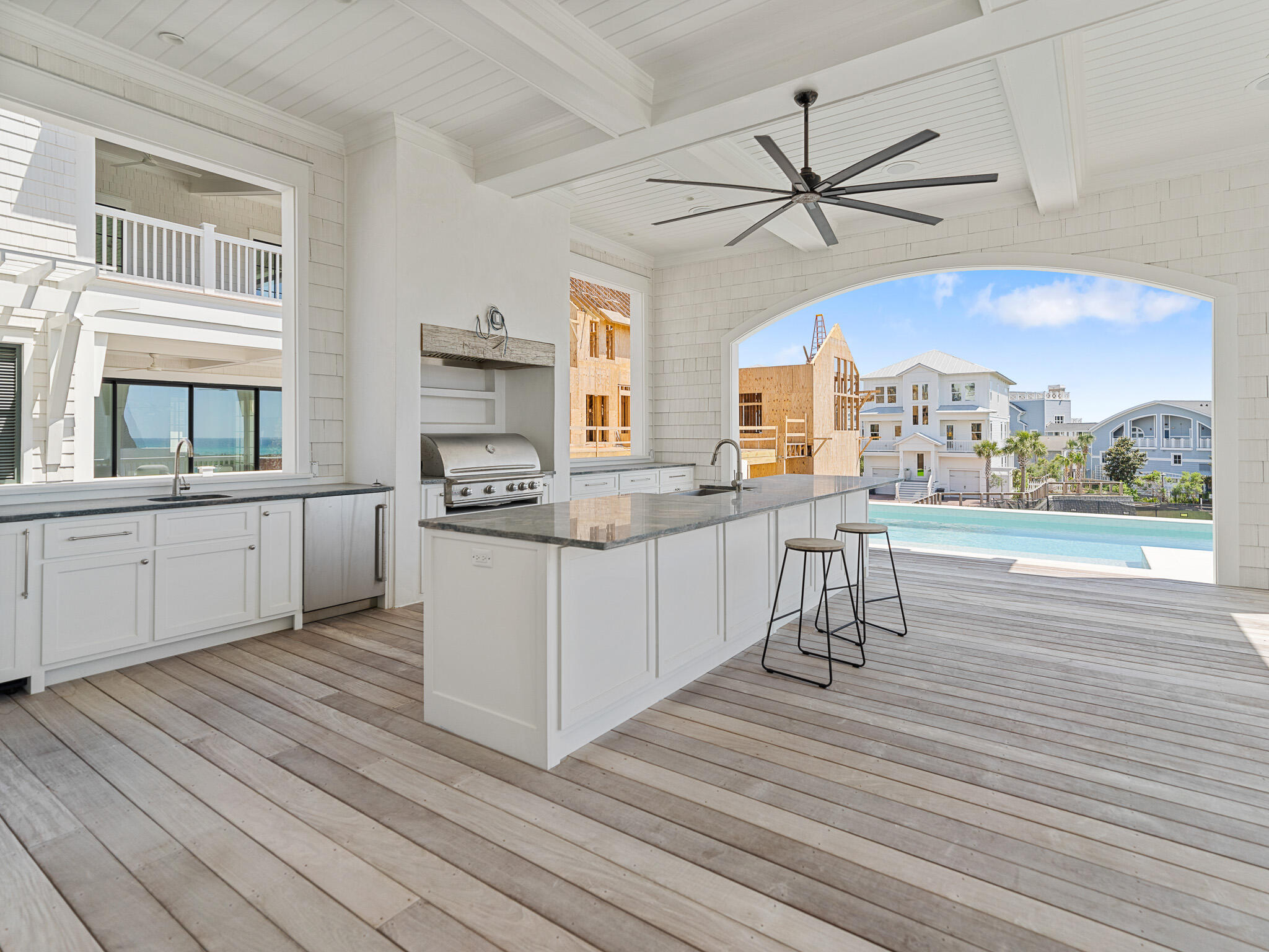 264 Grace Pt Way Watersound, FL 32461 - Photo 18 of 69 a kitchen with a cabinets and wooden floor