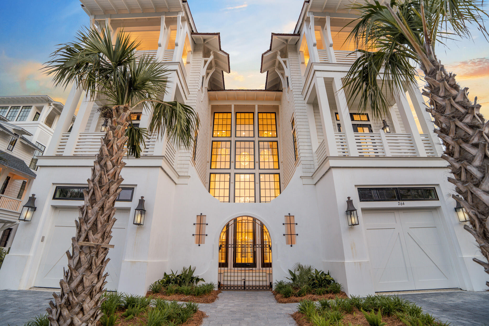 264 Grace Pt Way Watersound, FL 32461 - Photo 2 of 69 a front view of multiple houses with a yard