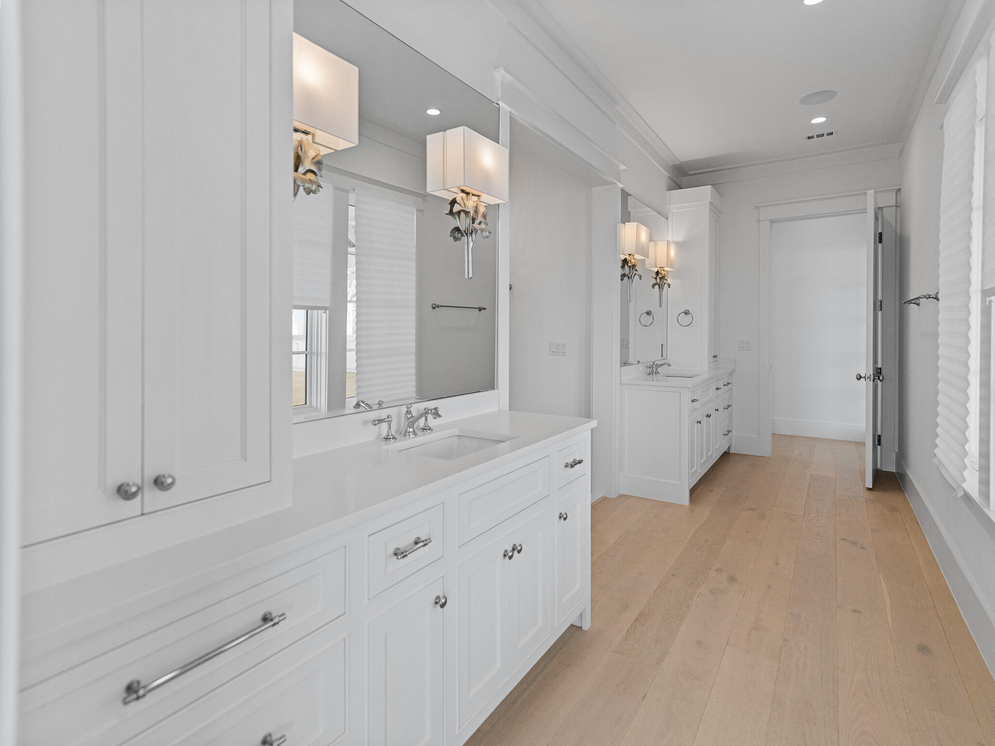 264 Grace Pt Way Watersound, FL 32461 - Photo 43 of 69 a spacious bathroom with double vanity mirror and shower