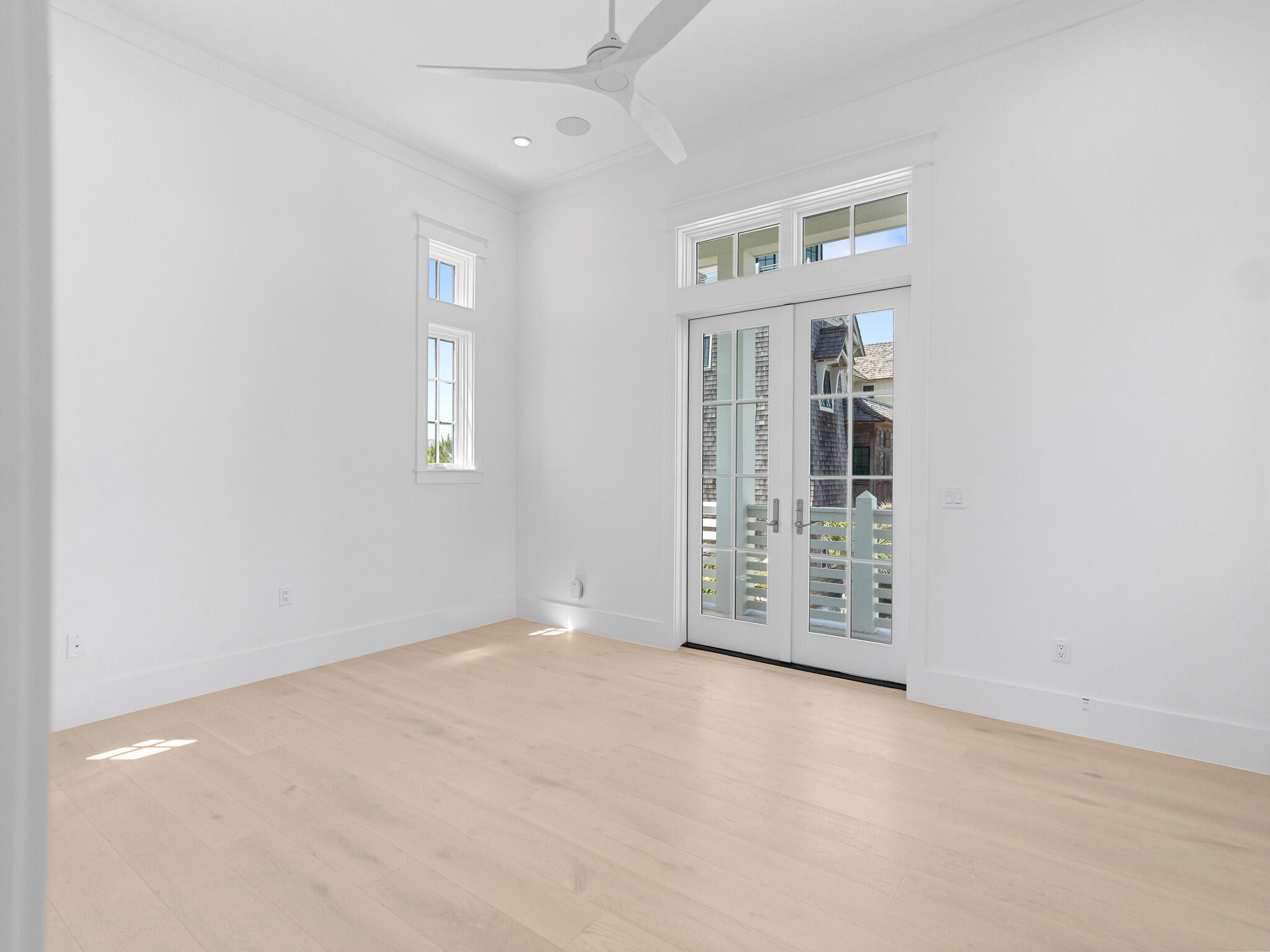 264 Grace Pt Way Watersound, FL 32461 - Photo 49 of 69 an empty room with windows & cabinet
