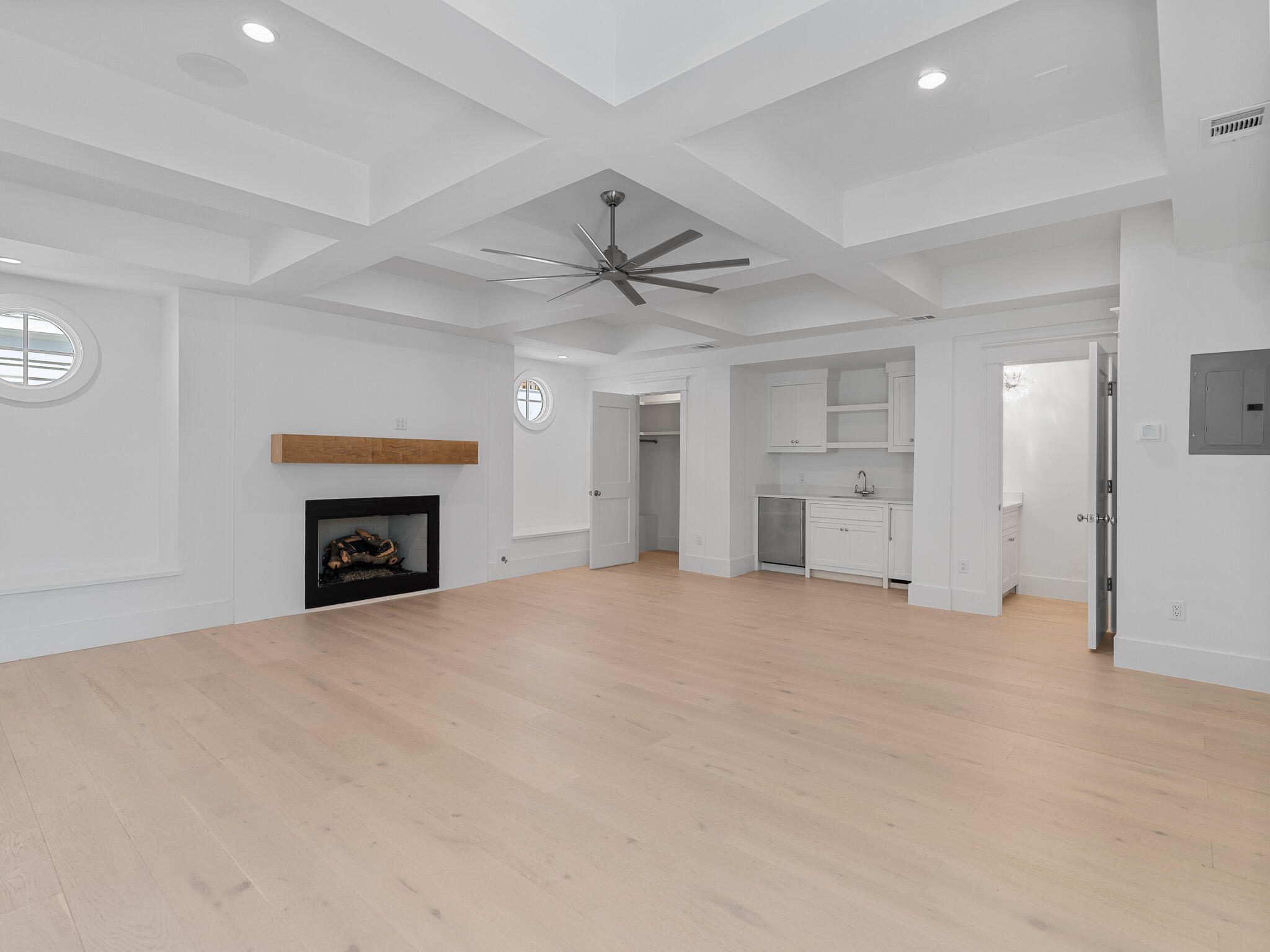 264 Grace Pt Way Watersound, FL 32461 - Photo 52 of 69 a view of an empty room with a fireplace