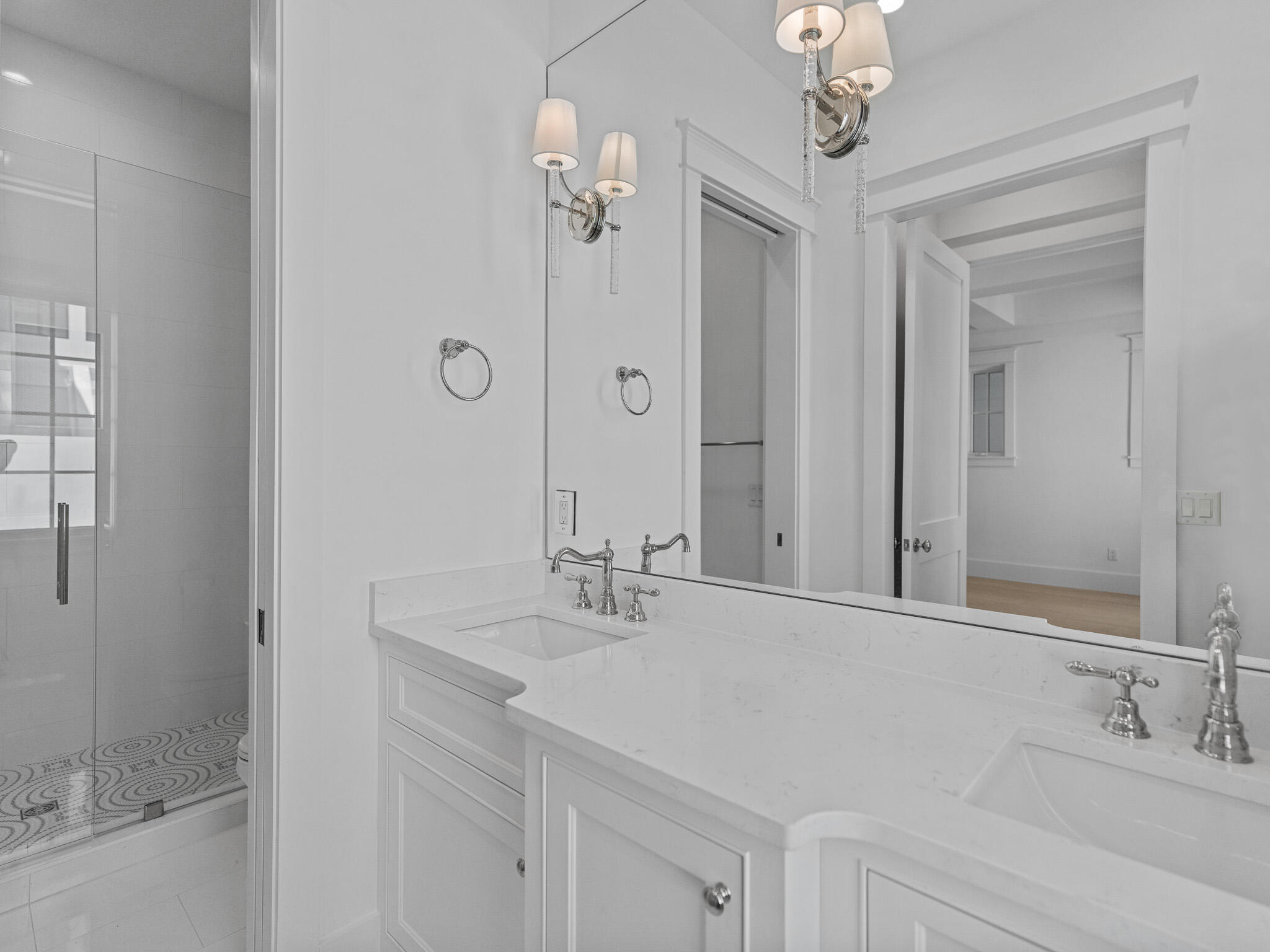 264 Grace Pt Way Watersound, FL 32461 - Photo 53 of 69 a bathroom with a sink double vanity and a mirror