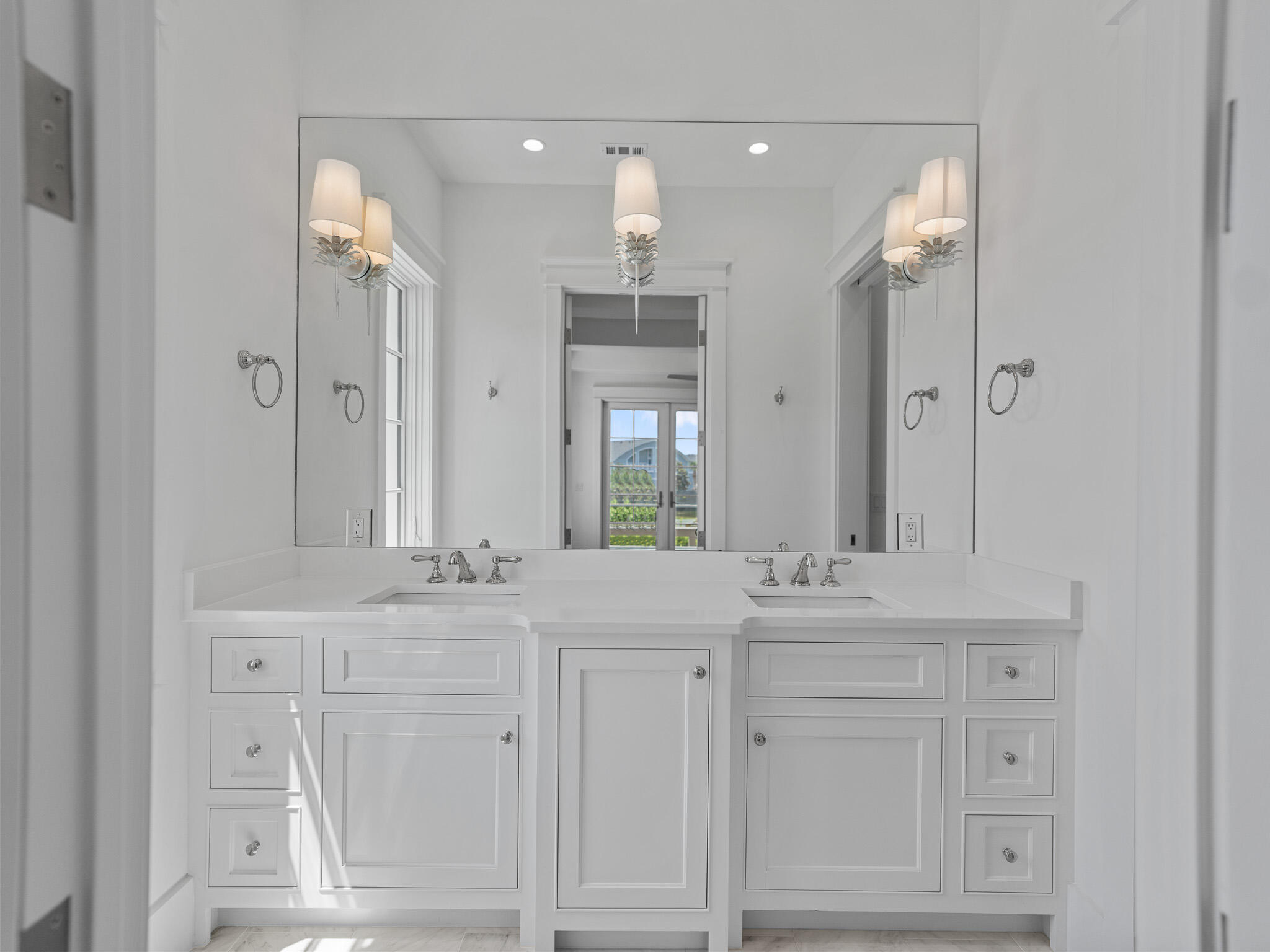 264 Grace Pt Way Watersound, FL 32461 - Photo 56 of 69 a bathroom with white cabinets and a sink