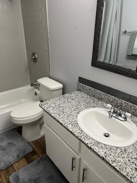 5603 Harvest Hill Road, Unit 2003 Dallas, TX 75230 - Photo 8 of 11 a bathroom with a toilet sink and mirror