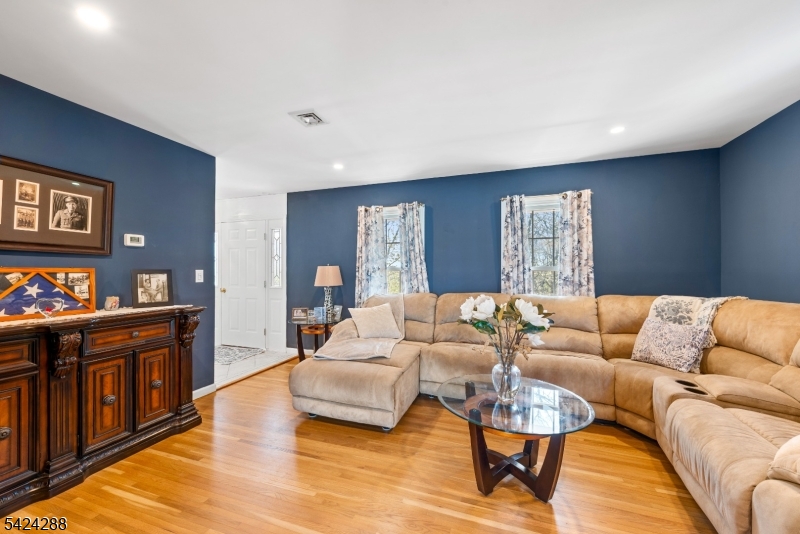8 Papoose Trail Hopatcong, NJ 07821 - Photo 11 of 38 a living room with furniture and wooden floor