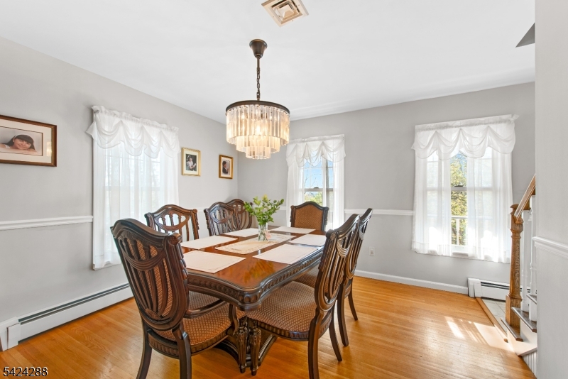 8 Papoose Trail Hopatcong, NJ 07821 - Photo 14 of 38 a view of a dining room with furniture window and wooden floor