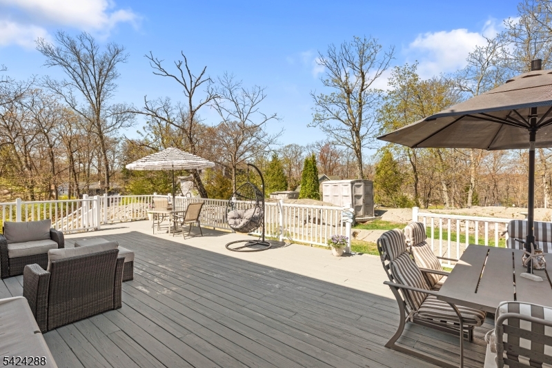 8 Papoose Trail Hopatcong, NJ 07821 - Photo 18 of 38 a view of outdoor space with seating area and barbeque oven