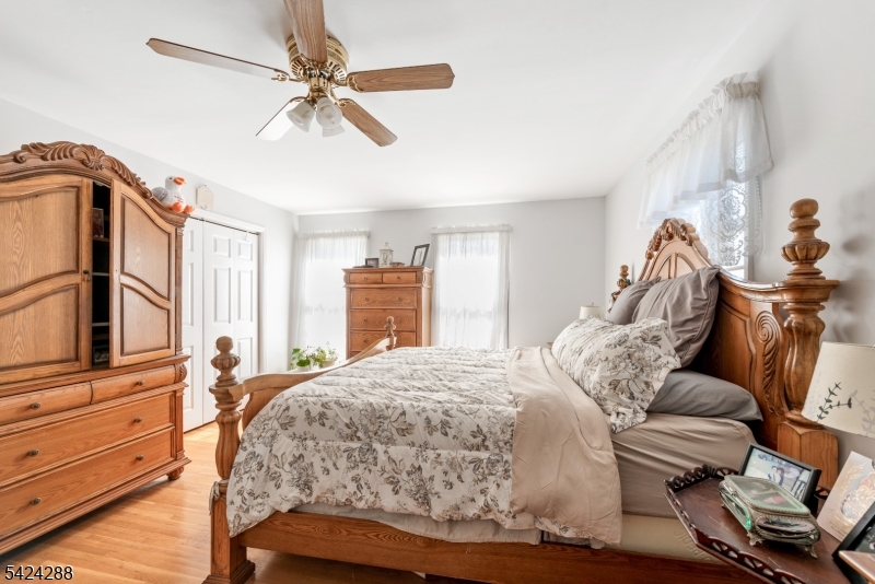 8 Papoose Trail Hopatcong, NJ 07821 - Photo 24 of 38 a bed room with a bed and a window