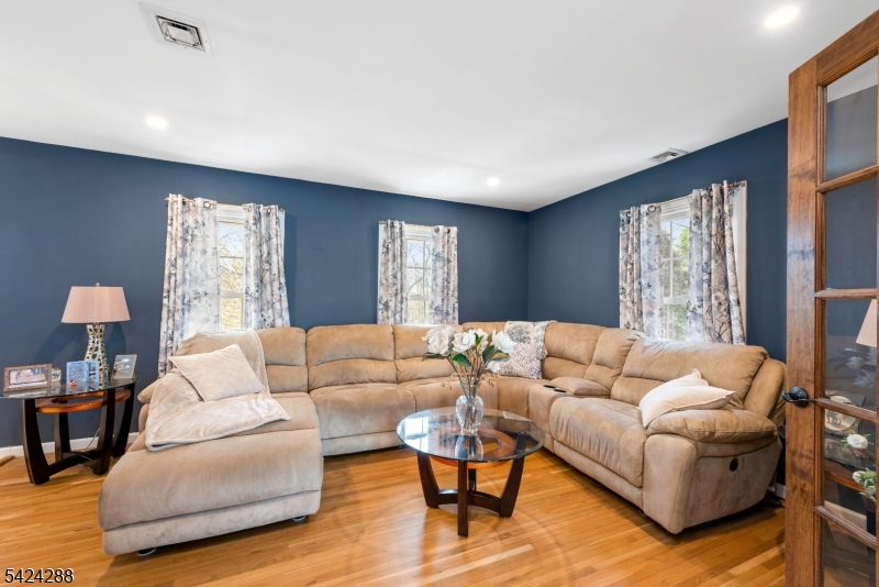 8 Papoose Trail Hopatcong, NJ 07821 - Photo 10 of 38 a living room with furniture and a large window