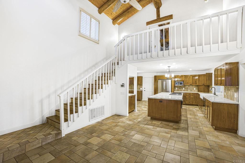 28720 Sandhurst Way Escondido, CA 92026 - Photo 22 of 57 a view of an entryway with staircase