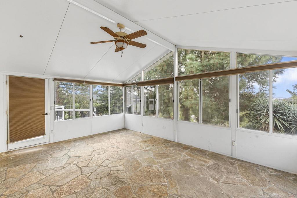 28720 Sandhurst Way Escondido, CA 92026 - Photo 33 of 57 a view of empty room with wooden floor and fan