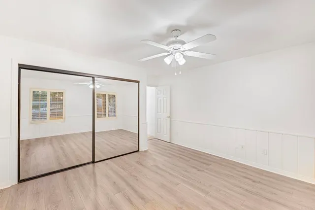 a view of a house with a yard and garage