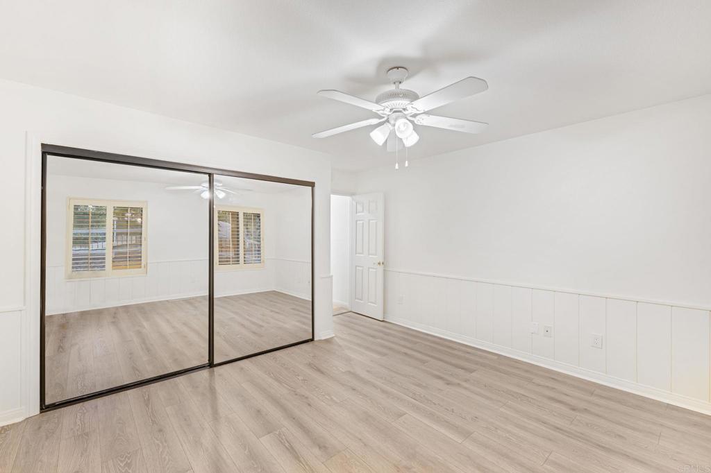 28720 Sandhurst Way Escondido, CA 92026 - Photo 43 of 57 a view of an empty room with glass door