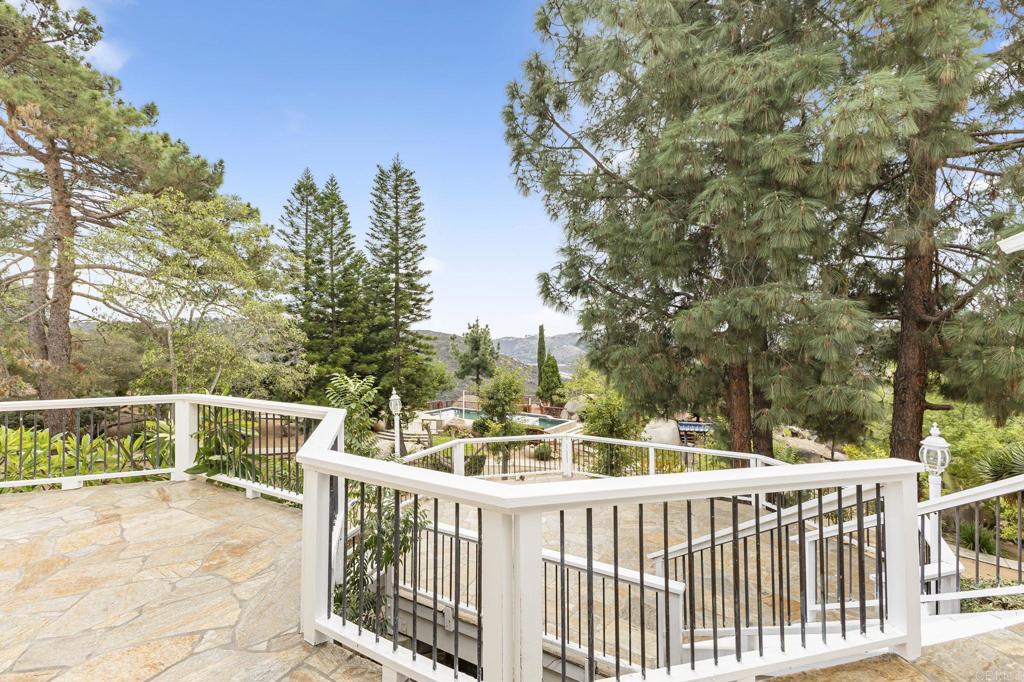 28720 Sandhurst Way Escondido, CA 92026 - Photo 50 of 57 a view of a deck with two chairs and a table