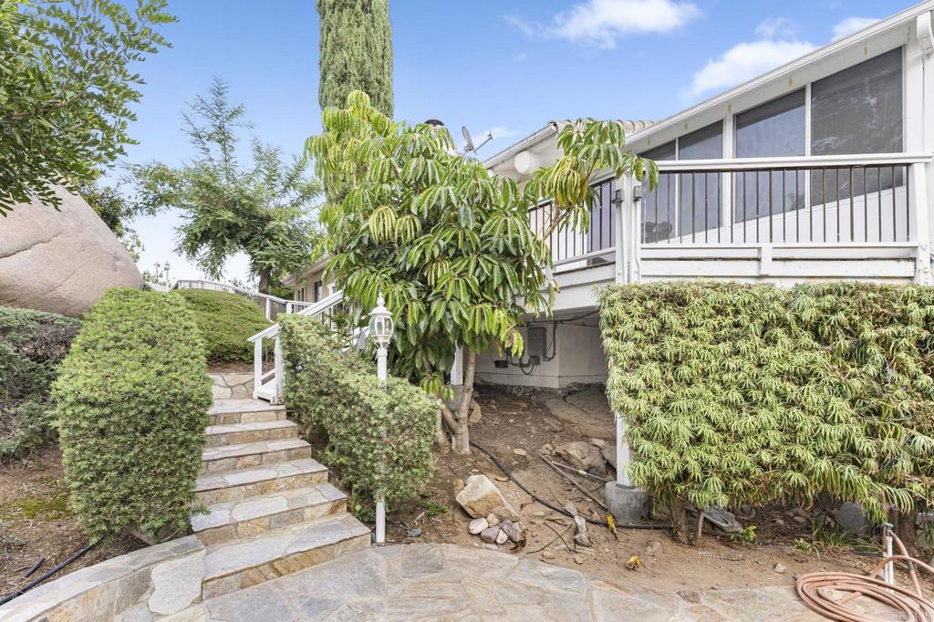 28720 Sandhurst Way Escondido, CA 92026 - Photo 56 of 57 a pathway of a house with a yard