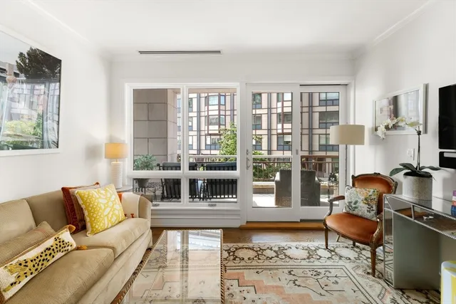 a living room with furniture fireplace and a flat screen tv