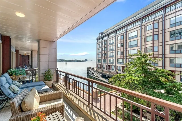 a view of balcony with furniture