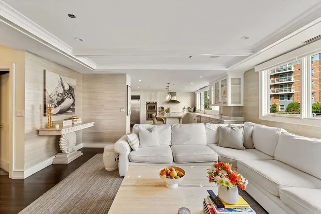 a living room with furniture and a table