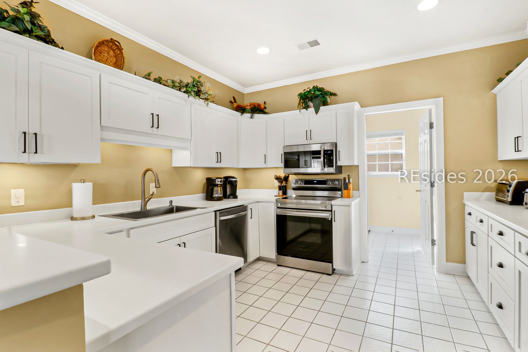 1 Gloucester Road, Unit E2 Hilton Head Island, SC 29928 - Photo 13 of 42 SS Appliances throughout the open kitchen