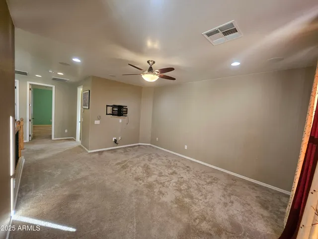 a bathroom with a shower and a toilet