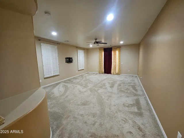 a bathroom with a mirror and a bathtub