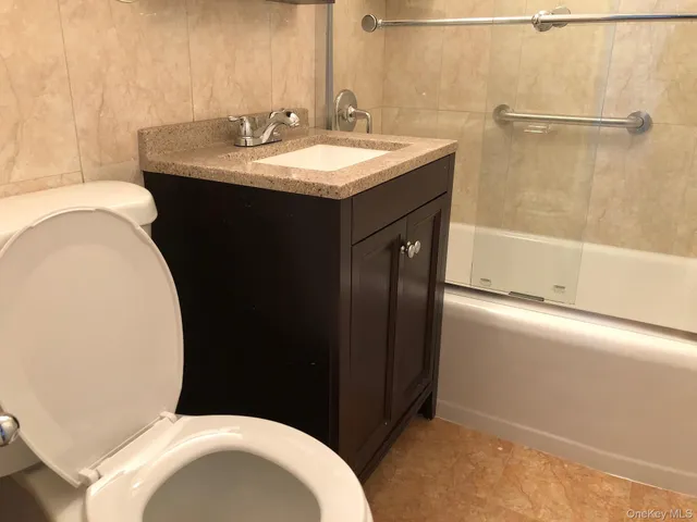 a bathroom with a sink and a toilet