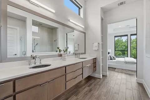 a bathroom with a sink and a mirror