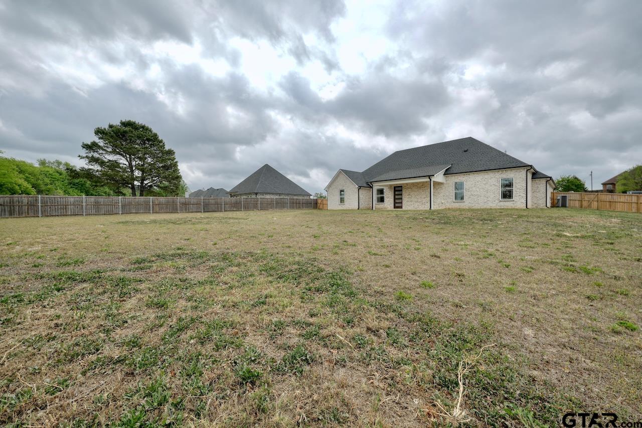 19383 Ridge Point Circle Lindale, TX 75771 - Photo 42 of 48 a front view of a house with a yard