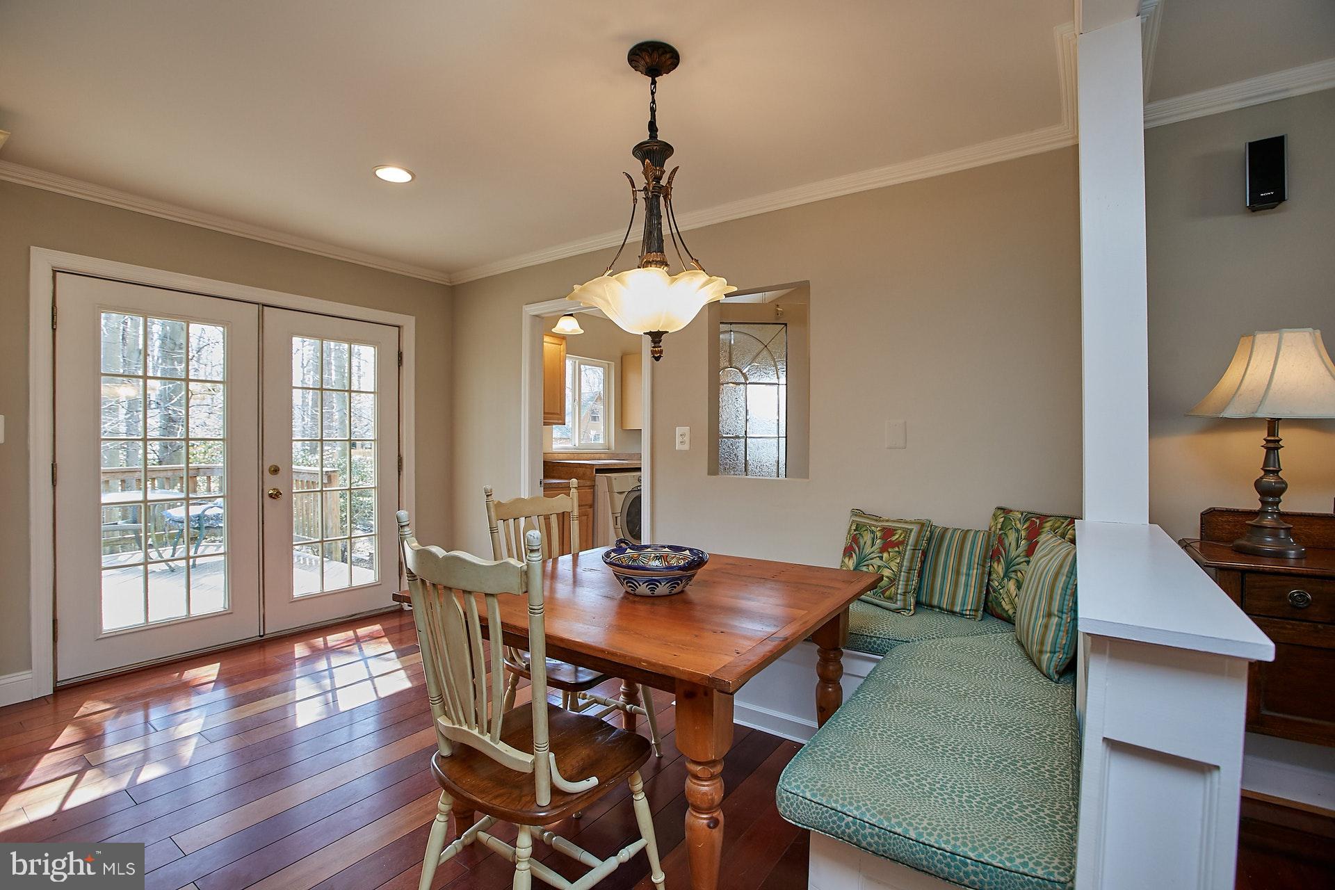 5536 Queensberry Avenue Springfield, VA 22151 - Photo 13 of 34 Dining area with doors to deck and yard