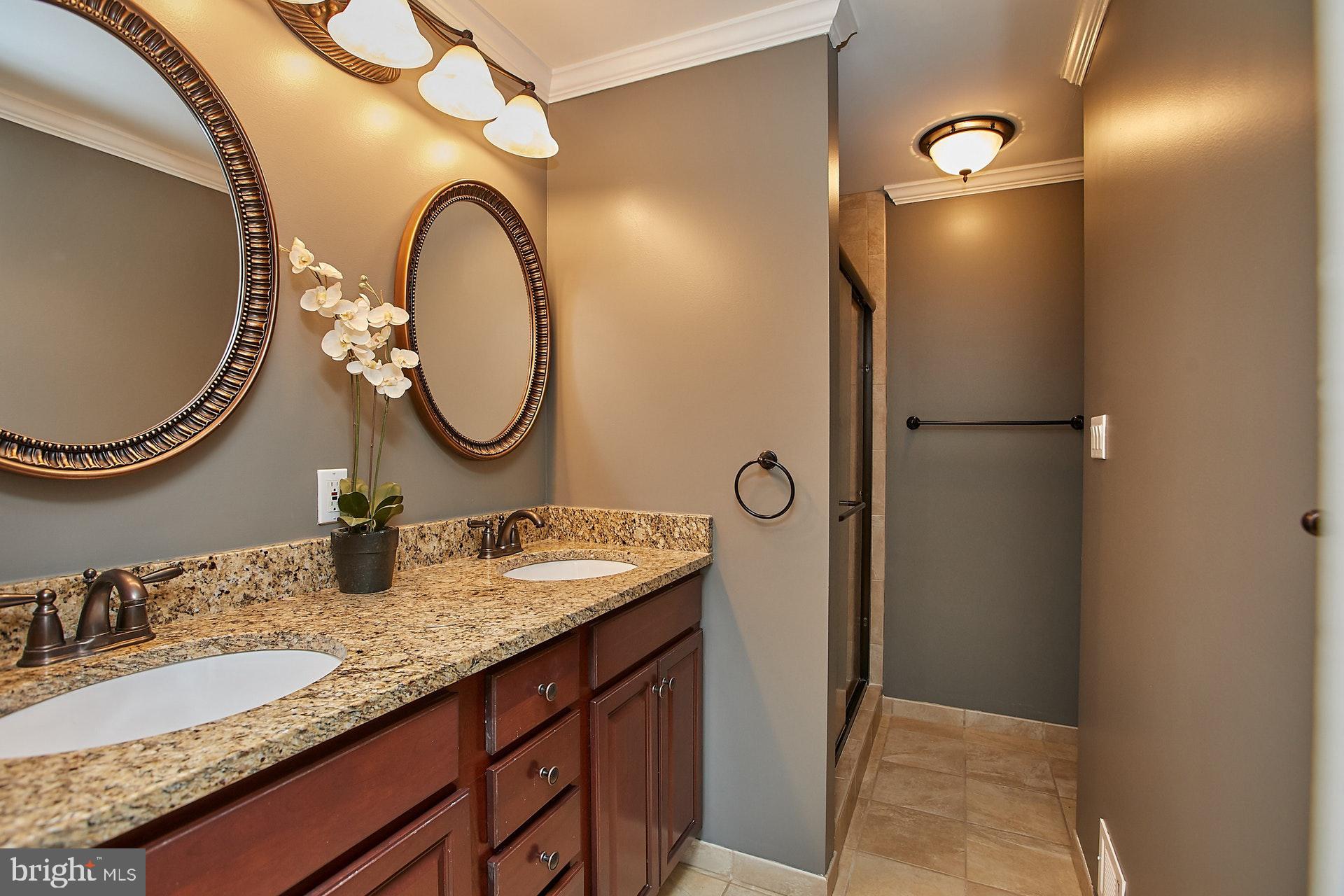 5536 Queensberry Avenue Springfield, VA 22151 - Photo 17 of 34 Remodeled master bath with dual vanity