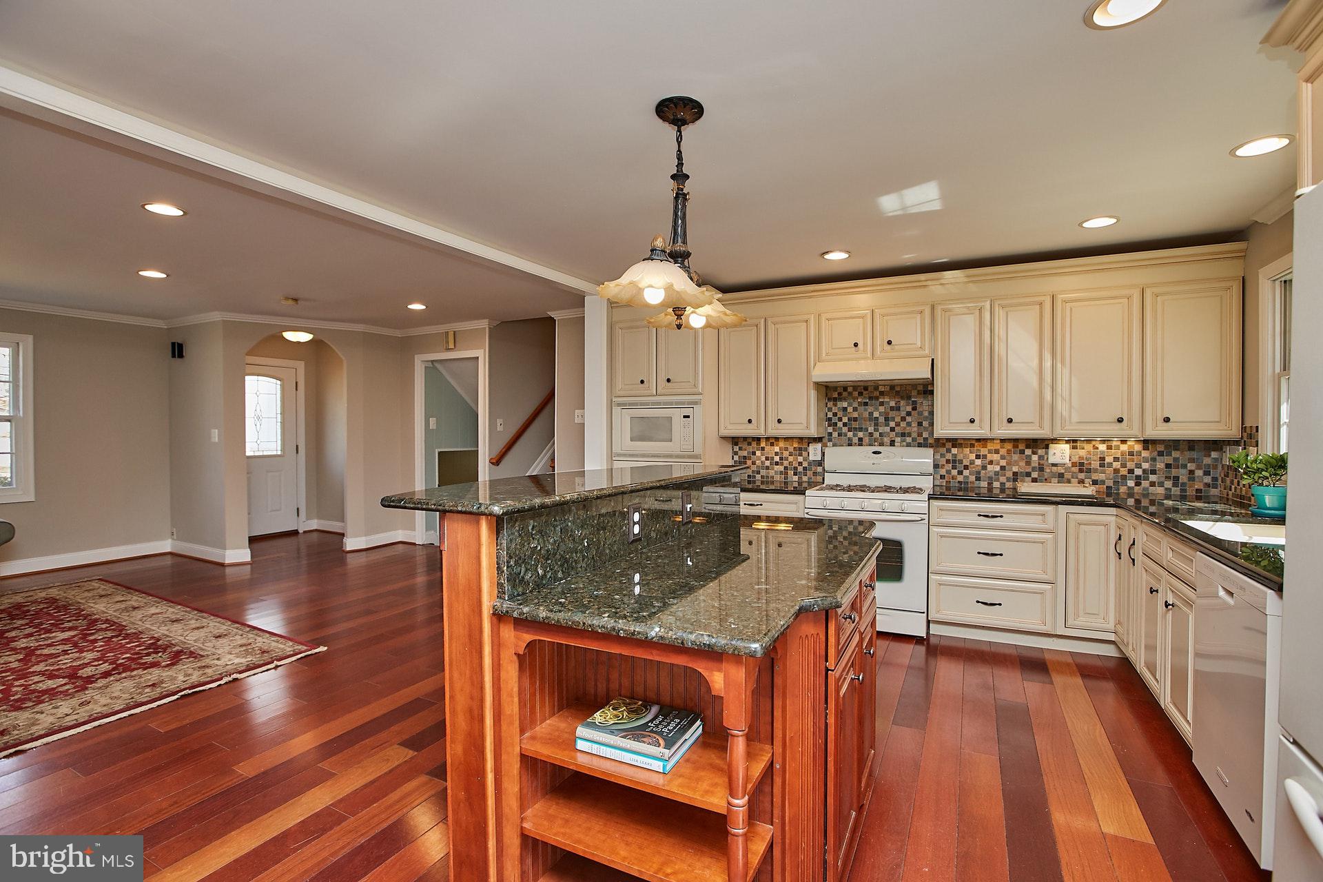 5536 Queensberry Avenue Springfield, VA 22151 - Photo 10 of 34 Remodeled kitchen with hardwood floors