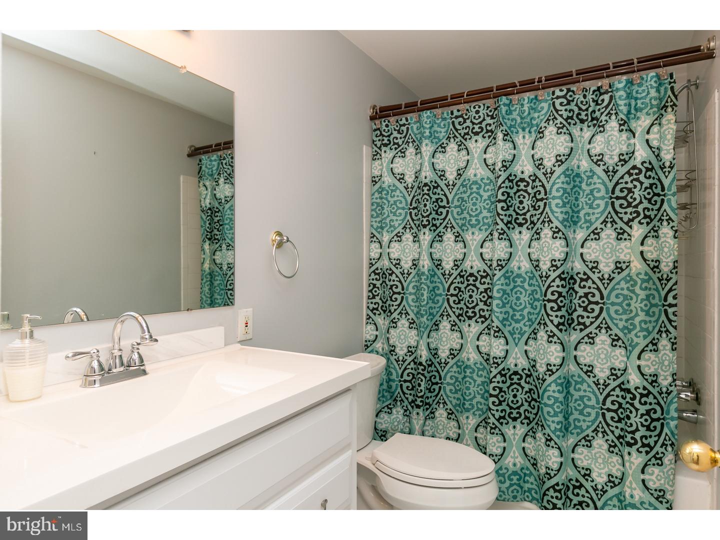 151 Antietam Road Delran, NJ 08075 - Photo 21 of 24 a bathroom with a sink and a mirror