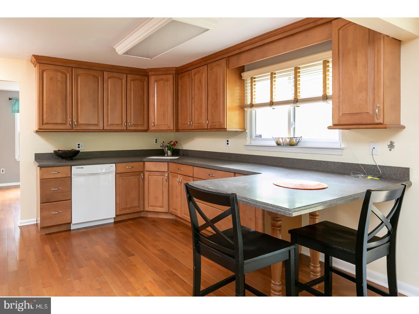 151 Antietam Road Delran, NJ 08075 - Photo 9 of 24 a kitchen with a sink cabinets and window