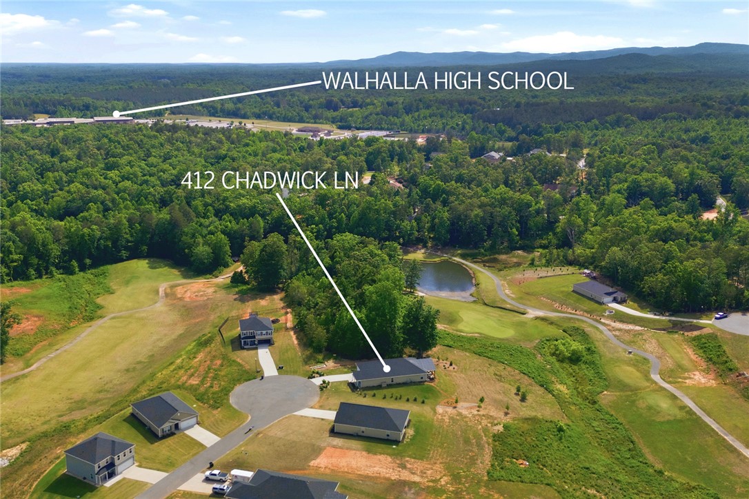 412 Chadwick Lane Walhalla, SC 29691 - Photo 33 of 37 Discover this property nestled amidst verdant woodlands, featuring a serene pond and convenient access to nearby education.