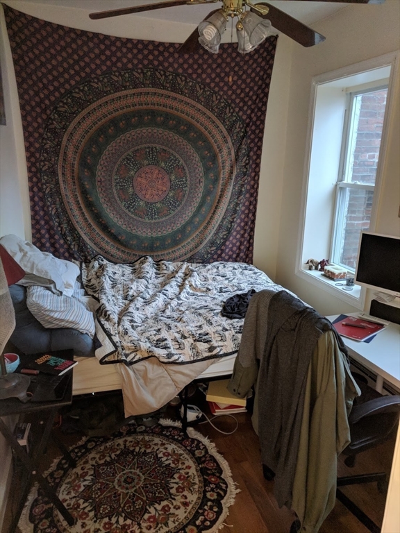 37 Cooper Street, Unit 3 Boston, MA 02113 - Photo 6 of 7 a living room with a couch