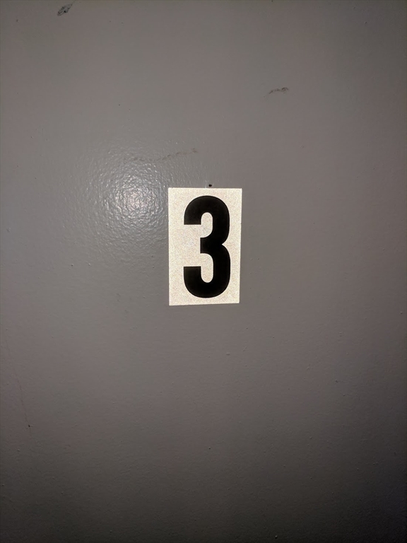 37 Cooper Street, Unit 3 Boston, MA 02113 - Photo 7 of 7 a close up of a wall with a window