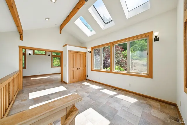 a view of an empty room and window