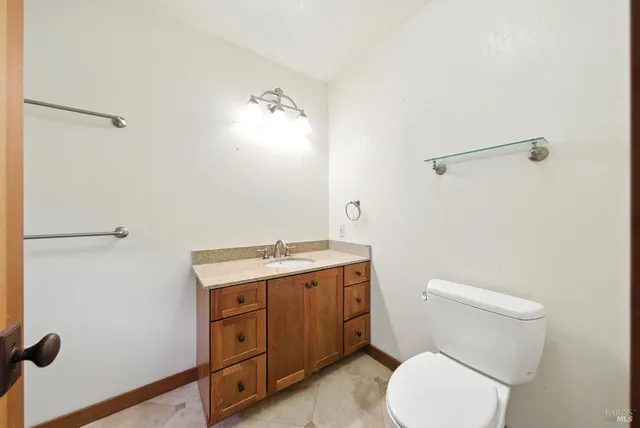 an aerial view of a house with mountain view