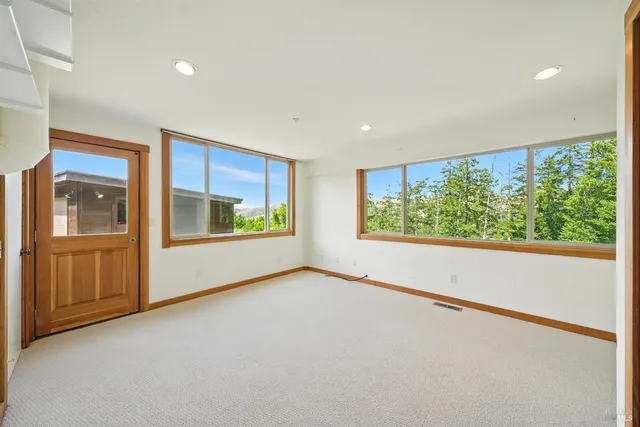 a view of a backyard with pathway