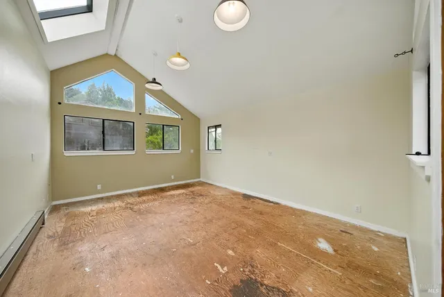 a picture of a bench in front of a wall