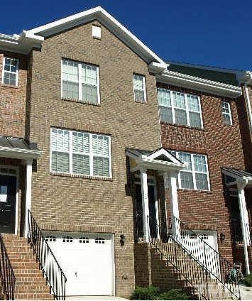 1029 Summerhouse Road Cary, NC 27519 - Photo 1 of 17 front view of a house with a door