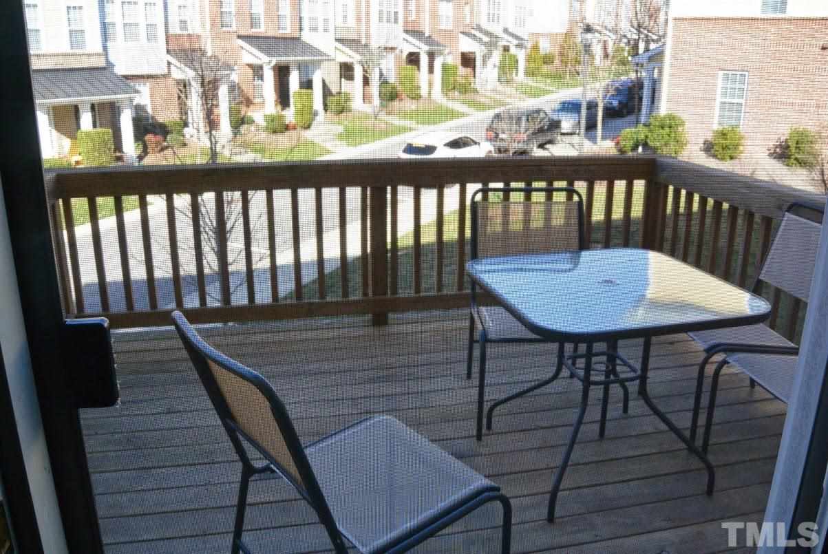 1029 Summerhouse Road Cary, NC 27519 - Photo 14 of 17 a view of a chairs on the roof deck