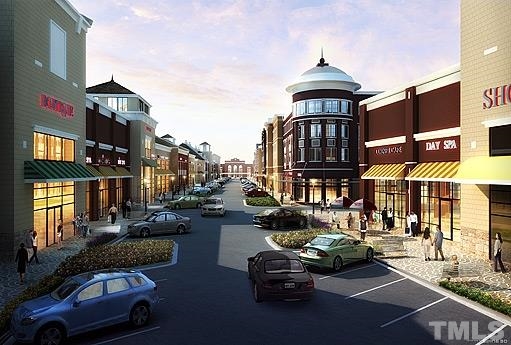 1029 Summerhouse Road Cary, NC 27519 - Photo 17 of 17 a city street lined with parked cars and buildings