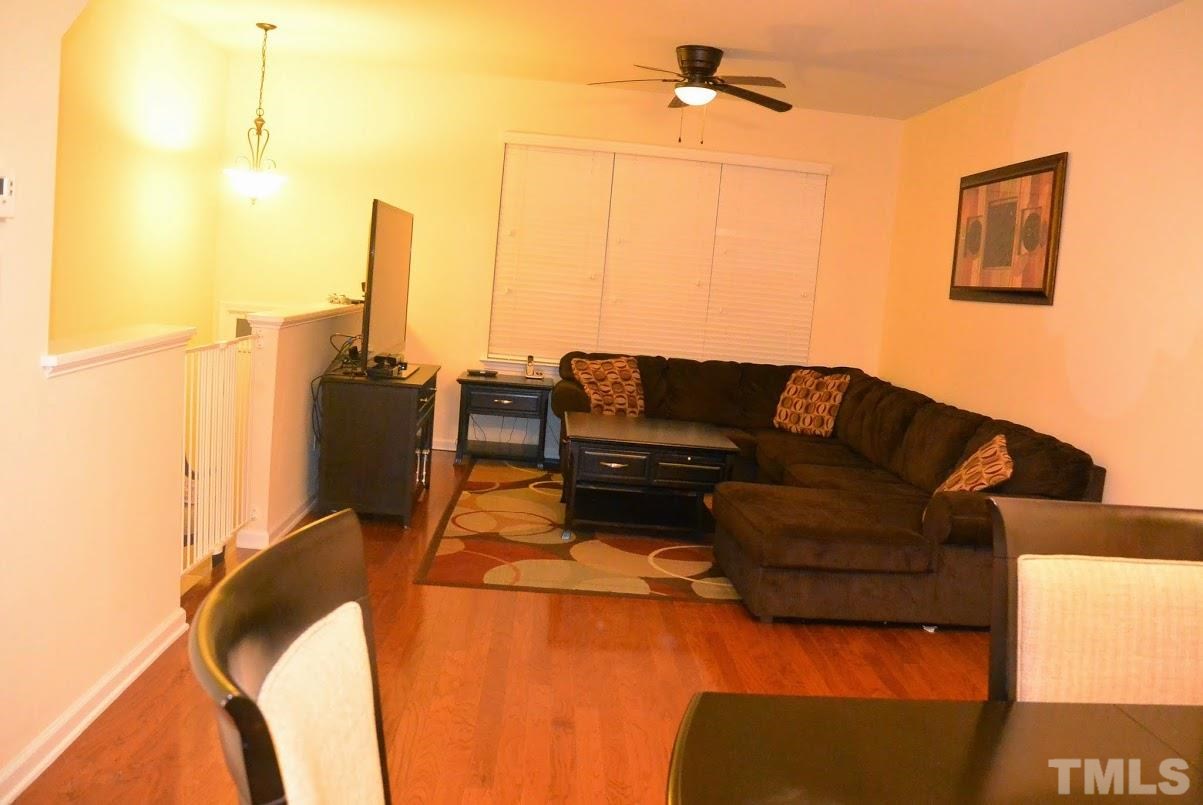 1029 Summerhouse Road Cary, NC 27519 - Photo 2 of 17 a living room with furniture