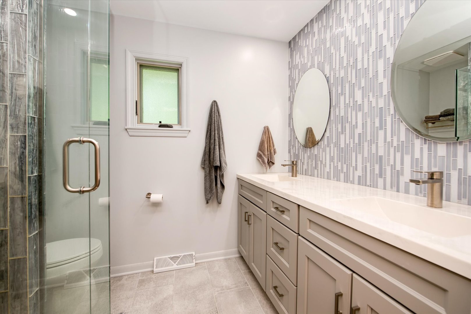 1196 Nottingham Lane Elgin, IL 60120 - Photo 33 of 45 a bathroom with a double vanity sink mirror and shower