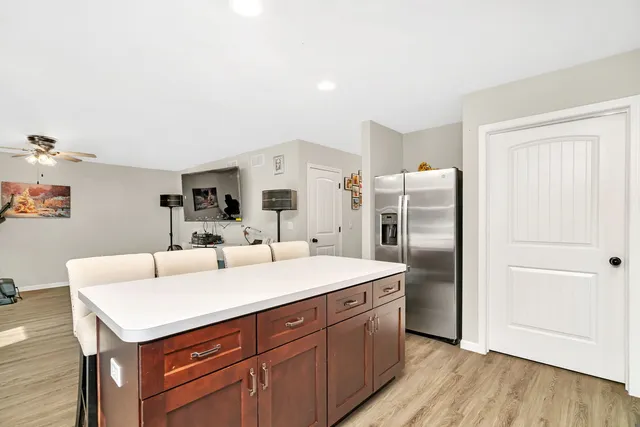 a kitchen with a refrigerator a sink and a refrigerator