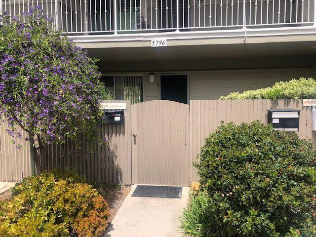 a house view with a outdoor space